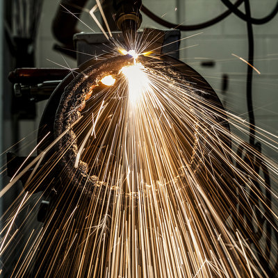 Welding sparks in a construction setting.